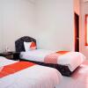 Отель OYO 2731 MIM Guest House Syariah, фото 4