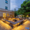 Отель Yuchen Holiday Hotel, фото 1