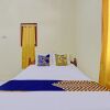 Отель SPOT ON 92930 Syifa Guest House Syariah, фото 6