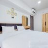 Отель Comfort And Spacious 2Br At Tamansari Bintaro Mansion Apartment, фото 4