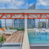 Отель 16th FL Bold CozySuites w/pool, gym, roof #1, фото 21