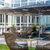 Отель Flightgate Munich Airport Hotel, a member of Radisson Individuals, фото 26