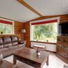 Отель Wooden Tree Trunk Bungalow at Fish Pond in Hoge Hexel, Optional with Hot Tub, фото 5