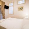 Отель Neoclassical apartment with 2 bedrooms in Piraeus, фото 4