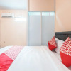 Отель Super OYO 1868 J&b Room Pramuka, фото 2
