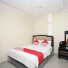 Отель OYO 184 Grand Putri Sriwijaya, фото 4