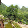 Отель Yinxin Valley Net Red Travel Photography and Hot Spring Resort (Yulong River Scenic Area Store), фото 3