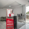 Отель RedDoorz Plus Syariah near Pondok Cabe Airport, фото 3