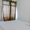 Отель Spacious and Comfortable 2BR Green Bay Pluit Apartment, фото 4