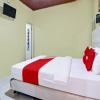 Отель OYO 92206 Maharani Guest House Syariah, фото 7