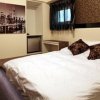 Отель Temple of Tainan Hostel - AnPing в Тайнани