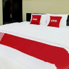 Отель OYO 92001 Unram Guest House, фото 5