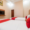 Отель Reddoorz Syariah Near Rs Mata Padang, фото 4
