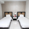 Отель Nida Rooms Lubis 3 Medan Baru at Hotel Rumah Anaya, фото 15