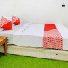 Отель OYO 90725 Zeevanna Guest House Syariah, фото 7