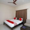Отель OYO 18965 Parampara Garden, фото 4