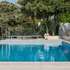 Отель Beachfront Villa Poseidon with Heated Pool, фото 8