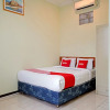 Отель OYO 90836 Bartu Guesthouse, фото 17
