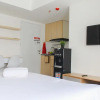 Отель Cozy Living Studio Room At Urbantown Serpong Apartment, фото 4