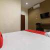 Отель RedDoorz near RS Adam Malik Medan 2, фото 7
