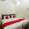 Отель RedDoorz Syariah near Lubang Jepang Bukittinggi, фото 11