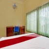 Отель Oyo 91572 Kost Esklusif Barokah, фото 13