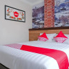 Отель OYO 809 Noura Guest House Syariah, фото 10