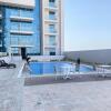 Отель Adorable Studio at Aura Residences Jebel Ali by Deluxe Holiday Homes, фото 1