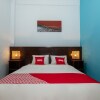 Отель Hening Homestay by OYO Rooms, фото 6