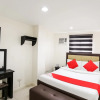 Отель OYO 393 Triangle Apartelle, фото 3