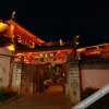 Отель Lijiang Dahuamao Inn, фото 1