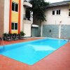 Отель Flora Legacy Apartments в Аккре