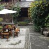 Отель Lijiang Monajia Inn, фото 12