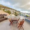 Отель Modern Sea Point Apartment With Rooftop Deck 9 on S, фото 14