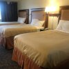 Отель Travelers Inn & Suites, фото 22