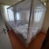 Отель Captivating 1-bed Apartment in Mombasa в Момбасе