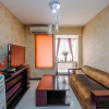 Отель Comfort And Homey 2Br At Nifarro Park Apartment, фото 1