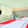 Отель OYO 89684 Mawaddah Inn Stay, фото 7