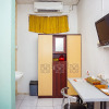 Отель OYO 433 Nelvi Guest House Syariah, фото 12