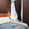 Отель Home Inn Executive Residence - Deluxe Room 2, фото 4
