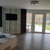 Отель KAMA Ferienhäuser Haus Karola, фото 14