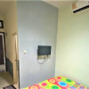 Отель OYO 91182 Kos'ta Homestay Makassar, фото 2