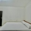 Отель OYO Life 93504 Kost Krisna, фото 11