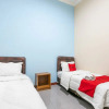 Отель Sakinah Guesthouse by RedDoorz, фото 22