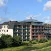 Отель App-Seewaerts-wohnen-2-1 в Бюзуме