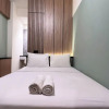 Отель Warm And Homey 2Br At Vida View Makassar Apartment, фото 1