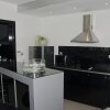 Отель Ktima Reveli Black Suite2-4 Persons, фото 3