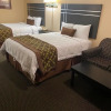 Отель Sunset Inn And Suites, фото 1