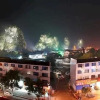 Отель Yangshuo Hao Ting Business Hotel, фото 1