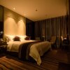 Отель Yujing Xuelian Boutique Hotel в Kangding